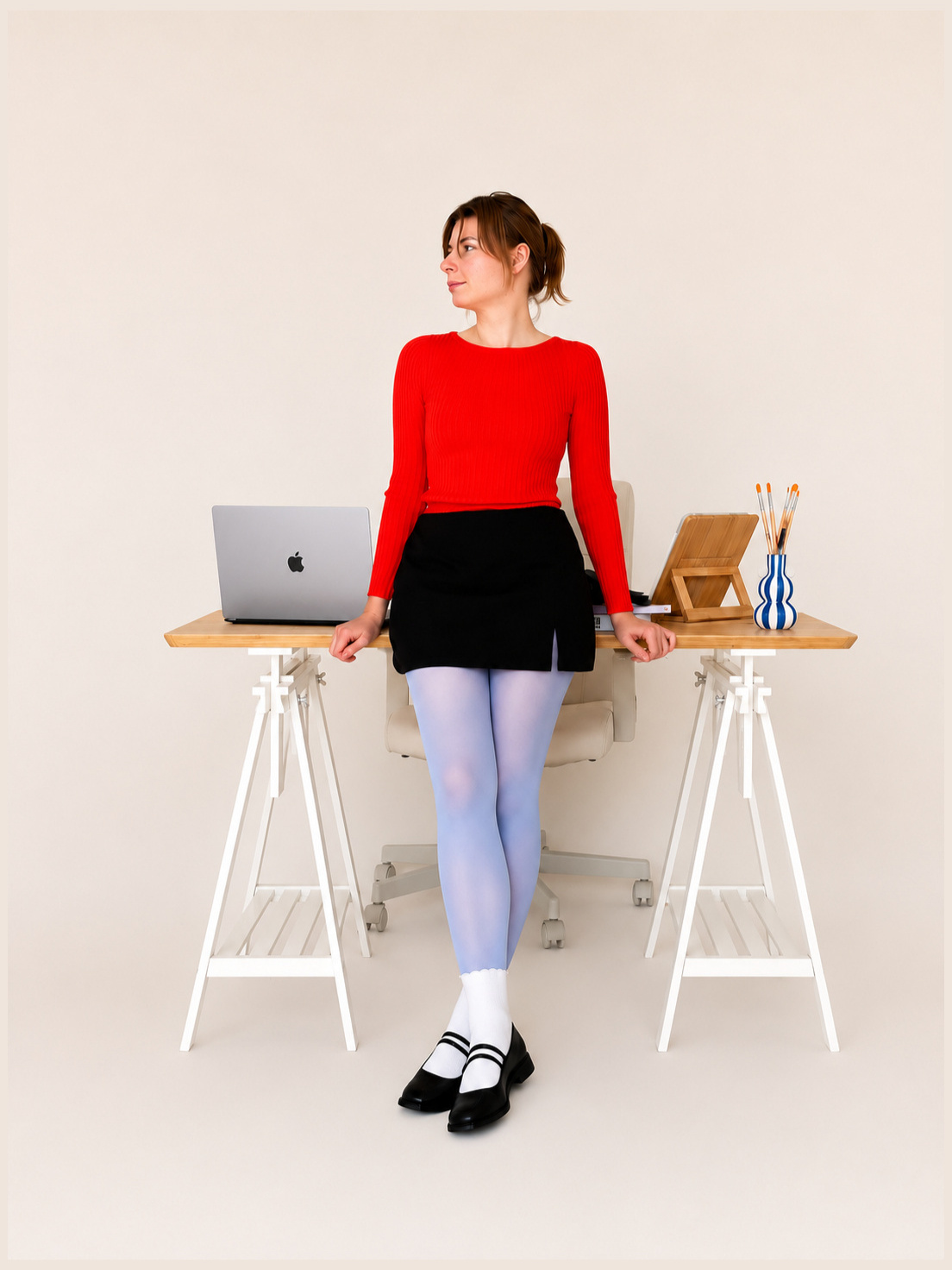 Full hero photo Vika Markouskaya at her studio desk